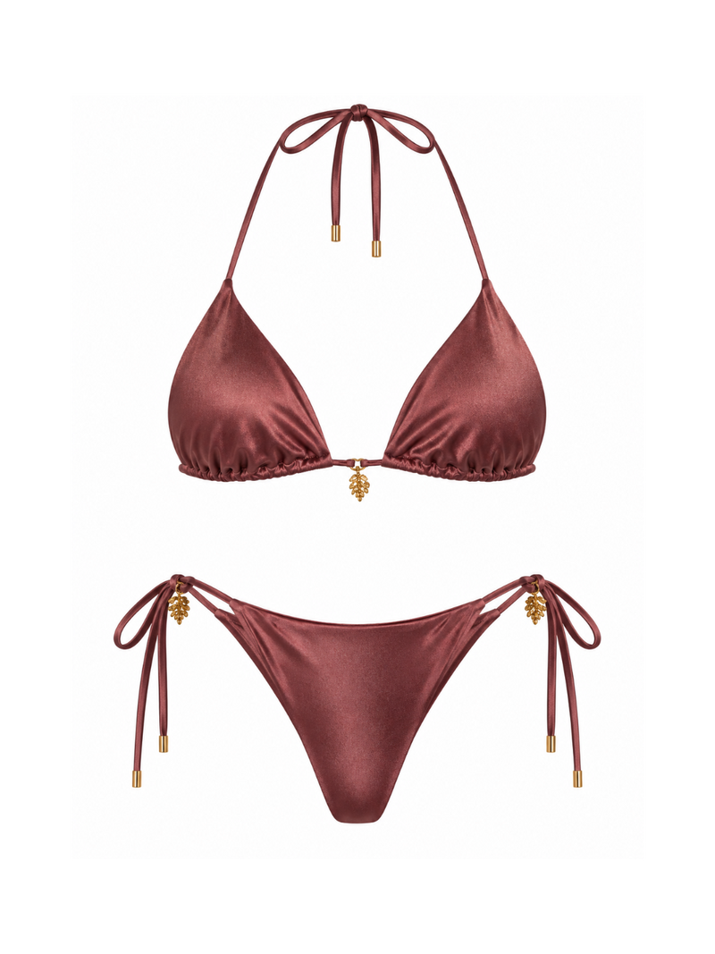 A two-piece satin bikini set in a deep chocolate color, featuring a halter triangle top with a small gold pineapple charm and matching tie-side bottom with gold pineapple accents, displayed on a solid white background.